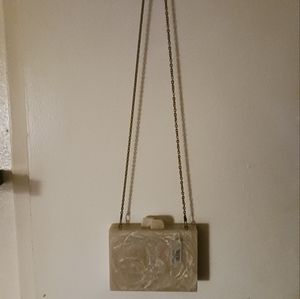 World Market tan tortoise shell purse. Made in India